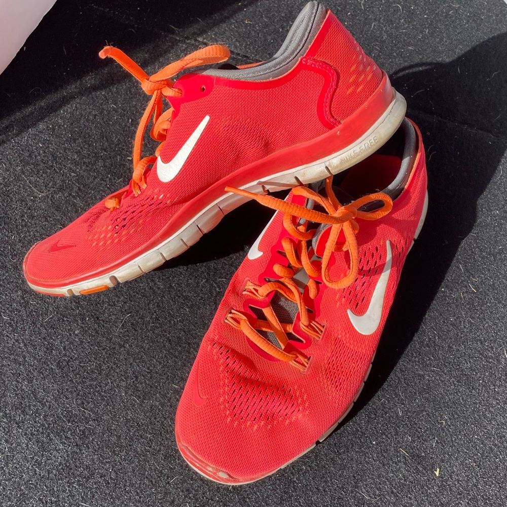 Nike Free TR fit 4. Orange and grey. Still in great shape, no tears or damage
